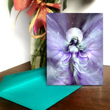 Greeting card with a fantasy violet and silver fairy design against a full moon by Primal Painter.