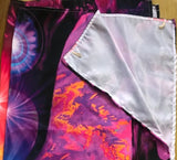 Colorful fabric with abstract patterns on a plain background