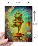 The dimensions of a colorful greeting card of a frog balancing in the tree pose on a mushroom and wearing a mushroom crown. Illustrated and created by Primal Painter.