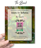 The back of a colorful greeting card with Ribbets for Reflection by Sir Sipsalot and logo/QR code for Primal Painter website.