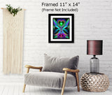 Two twin flame angels stand face to face, hands clasped, a red starburst grounding them at the base and a green starburst glowing inside a heart above their heads. Art called Unconditional Love by Primal Painter. Framed hanging over a chair, 11x14