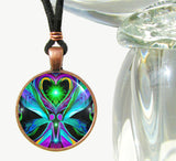 Handmade necklace featuring colorful energy art sealed under a glass dome by Primal Painter of twin flame angels hand in hand under a green heart