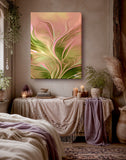 'Wild and Free" by Primal Painter is pastel abstract art canvas print featuring swirls of ochre and green on a tan wall above  a dresser in a bedroom
