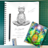 Pencil sketch of a frog in a meditation pose with the full-color greeting card on the bottom against a green grid background