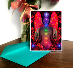 A greeting card featuring a colorful image of a chakra angel with a rainbow aura, sitting within a vibrant, psychedelic mandala. Art by Primal Painter