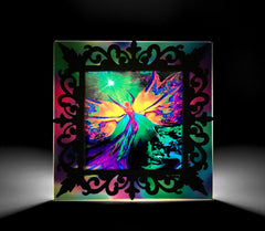 A 3D rainbow angel night light displaying a colorful image of an angel within a Victorian-style wood frame, enclosed in a clear acrylic panel. Art by Primal Painter