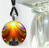 Necklace with rainbow abstract artwork with a sunburst at the top and a heart at the bottom