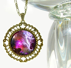 guardian angel artwork with a starry space background and set inside a large bronze necklace setting with symbolism