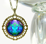 Purple & Teal Twin Flames Hippie Necklace in a fancy bronze setting