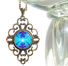 diamond shaped lacey filligree prendant, abstract art necklace with blue and purple geometric patterns by Primal Painter