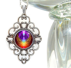 diamond shaped fancy necklace featuring chakra art encased in angel wings by Primal Painter