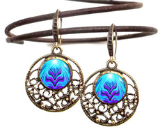 blue and purple abstract flower artwork as round lacy earrings by Primal Painter