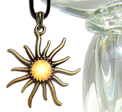 yellow starburst art print under glass dome in a sun-shaped pendant by Primal Painter