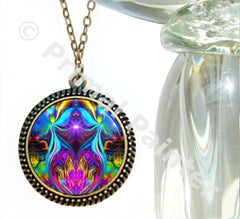 Violet Flame Necklace with twin flame angels in a round bronze pendant setting and set under glass by Primal Painter