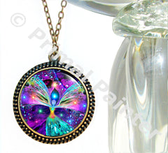 A colorful chakra art angel necklace with a round pendant featuring a multicolored, swirling pattern design, attached to a bronze-finished curb chain by Primal Painter.