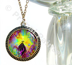 A colorful angel necklace with a multicolored flame design on a dome, set in a bronze-finished brass alloy setting with a bronze-finished curb chain by Primal Painter.