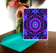 A greeting card with a purple, blue, and green mandala design and the text 'THIRD EYE SPIRAL' on the back, along with the Primal Painter logo.