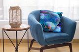square throw pillow featuring abstract blue and purple artwork entitled "Spirit Orbs" by Primal Painter of overlapping orbs
